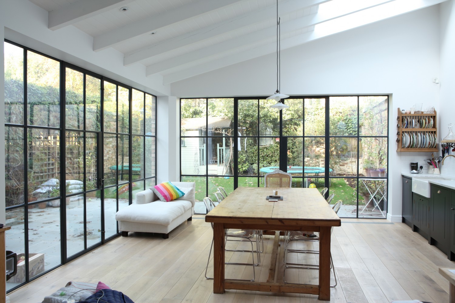 Steel windows create connected space for Victorian house extension ...